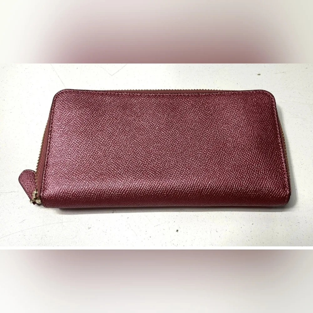 Coach Burgundy Leather Wallet.